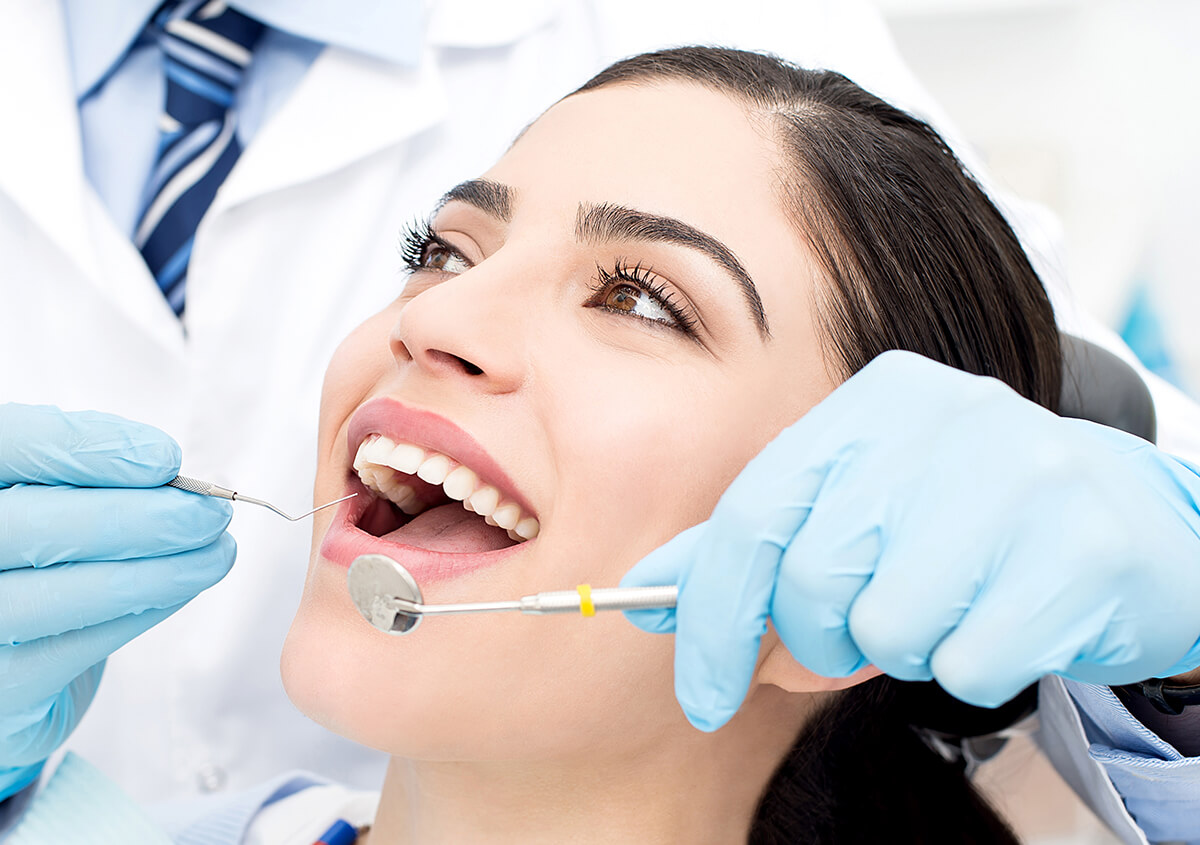 Fallbrook dentist explains the dental implant restoration process for replacing missing teeth